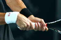 Prise de raquette de Novak Djokovic en revers à 2 mains